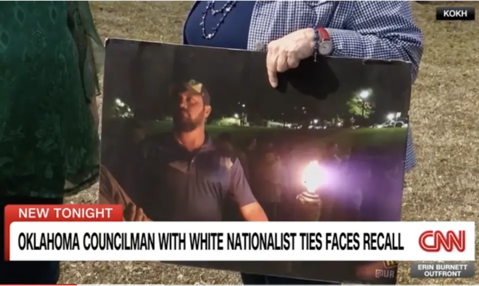 Screenshot of CNN banner stating "Oklahoma Councilman with White Nationalist Ties Faces Recall"