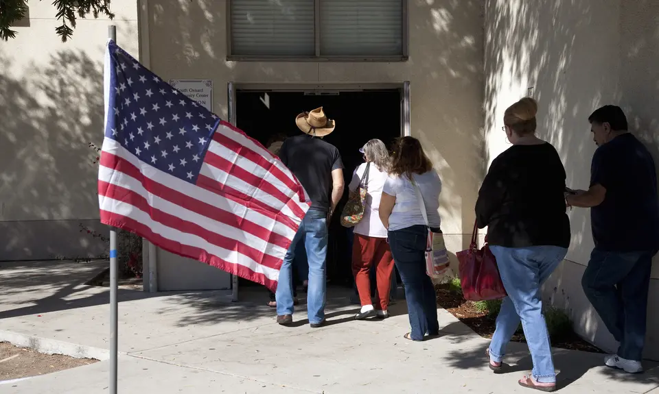 Voters waiting in line at polling place