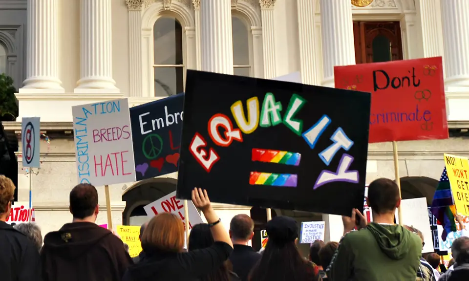 A sign being held at a protest which reads "EQUALITY"