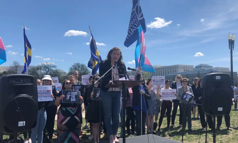 Charlotte Clymer speaking at rally