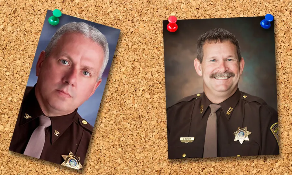 To images of male sheriffs pinned to a bulletin board.