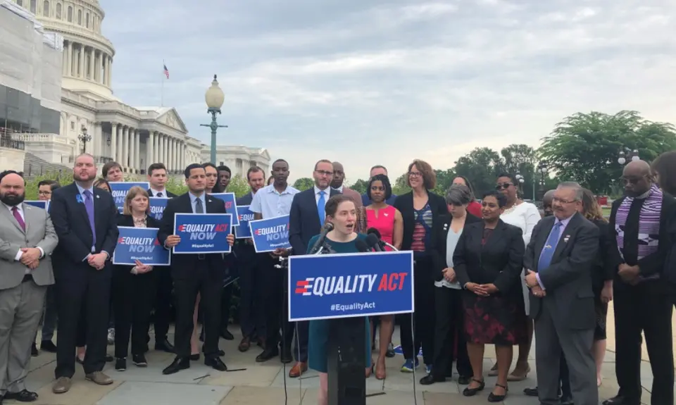 Jen Herrick speaks in front of a group of activists outside the U.S. Capitol Building in support of the Equality Act