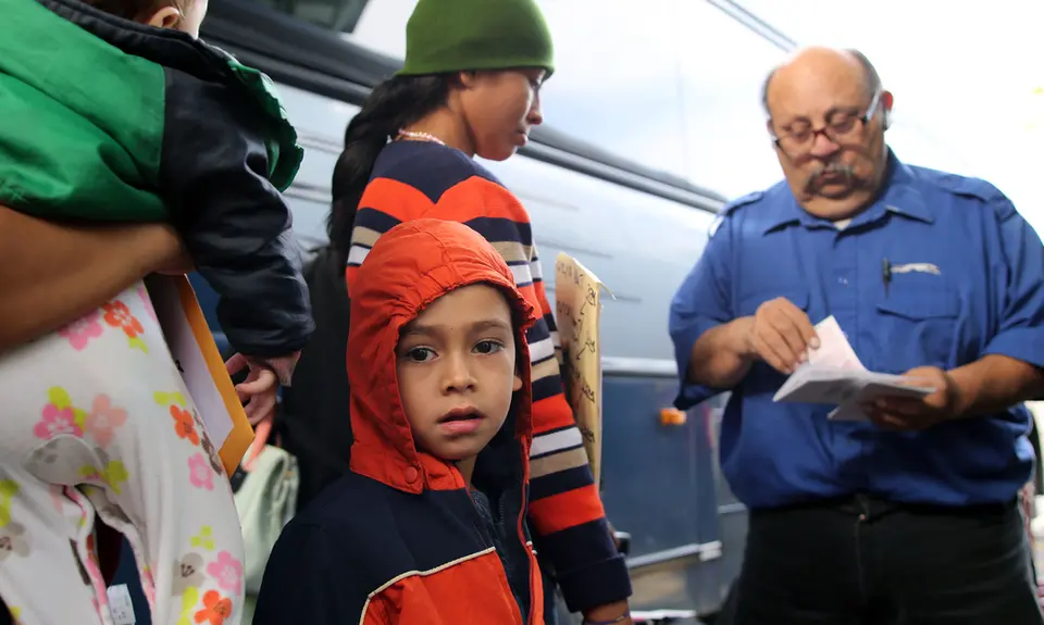 A young Central American boy who entered the U.S. illegally boards a bus with his mother to go to their sponsor where they'll wait for an asylum hearing.