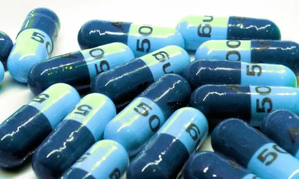 several tablets that are half light blue and half dark blue