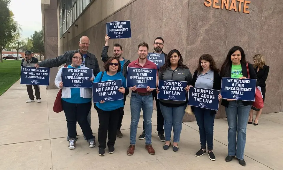 PFAW members and local activists rally outside of the Arizona Capitol to demand that Martha McSally support calling witnesses in impeachment