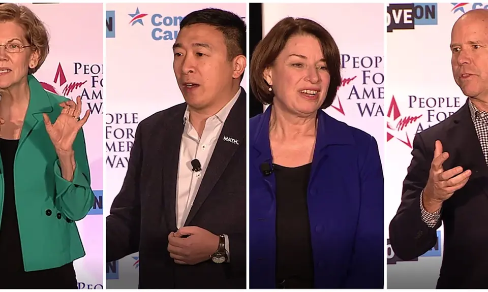 Presidential candidates Amy Klobuchar, John Delaney, Elizabeth Warren and Andrew Yang at the "We the People" democracy forum in Des Moines, Iowa.