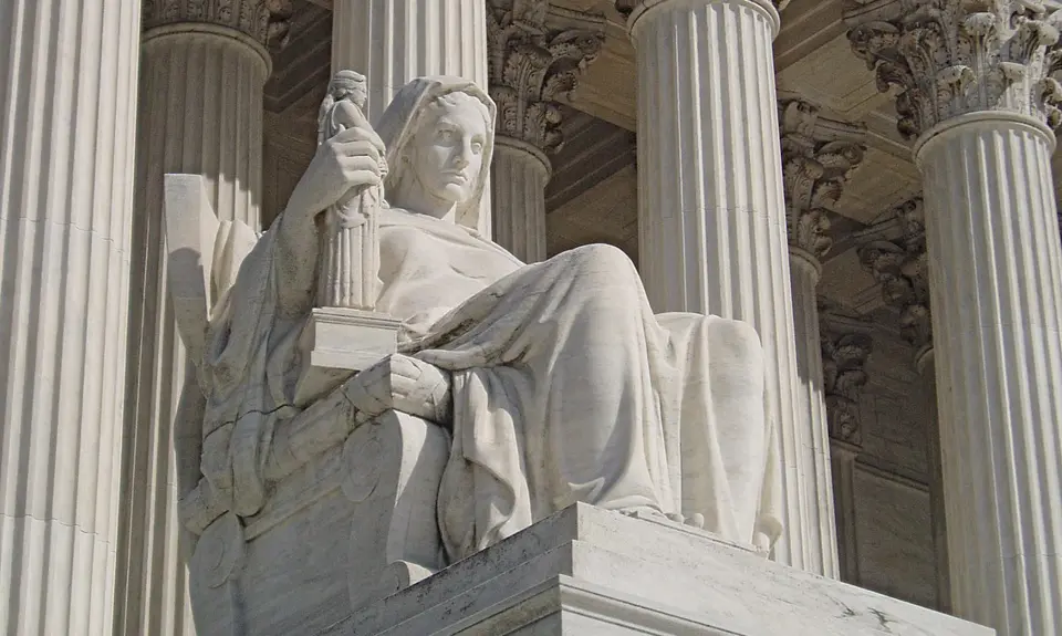 James Earle Fraser's statue The Contemplation of Justice, which sits on the west side of the United States Supreme Court building, on the north side of the main entrance stairs.