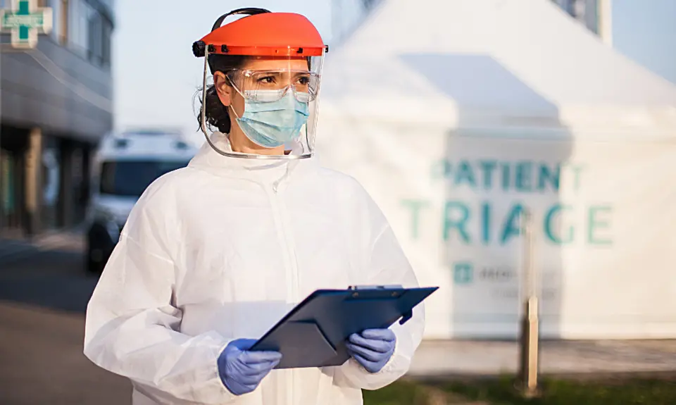 Health care worker in protective gear.