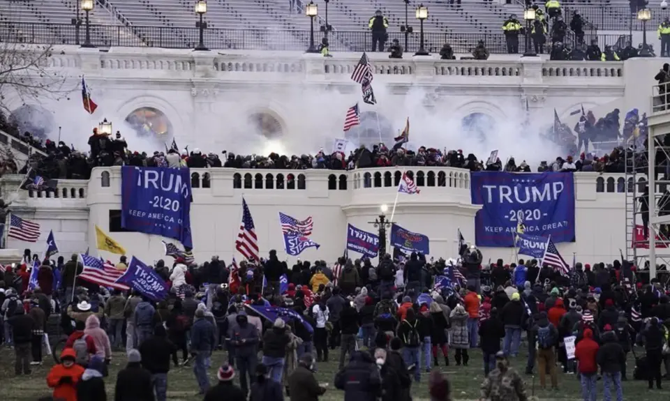 Insurrectionists loyal to President Donald Trump storm the Capitol, Jan. 6, 2021, in Washington. The former president is scheduled to appear in D.C. court today to confront new charges related to his effort to overturn the results of the 2020 presidential election.