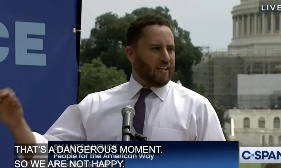 People For President Svante Myrick speaking at a podium