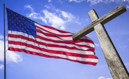 An American flag and a cross.