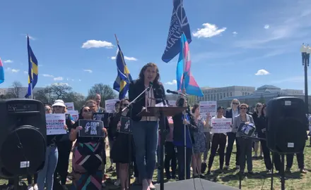 Charlotte Clymer speaking at rally