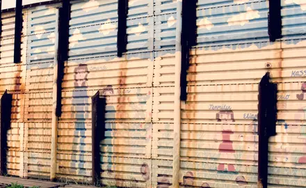 Paintings of children on the US -Mexico border wall in Arizona