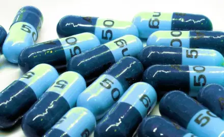 several tablets that are half light blue and half dark blue