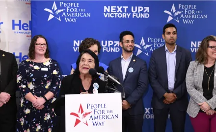 Dolores Huerta at the speaker's podium at PFAW's Next Up 2019 Virginia kickoff event.