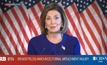 A screenshot of CBS News showing Nancy Pelosi standing in front of a line of American flags with the text "Speaker Pelosi announces formal impeachment inquiry."