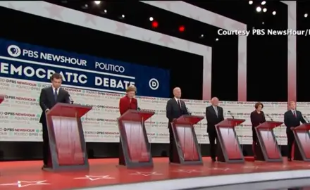 Democratic candidates on the stage during the December 2019 debate hosted by PBS Newshour and Politico