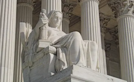 James Earle Fraser's statue The Contemplation of Justice, which sits on the west side of the United States Supreme Court building, on the north side of the main entrance stairs.