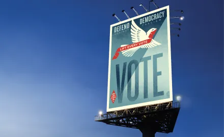 A billboard that says "Vote"