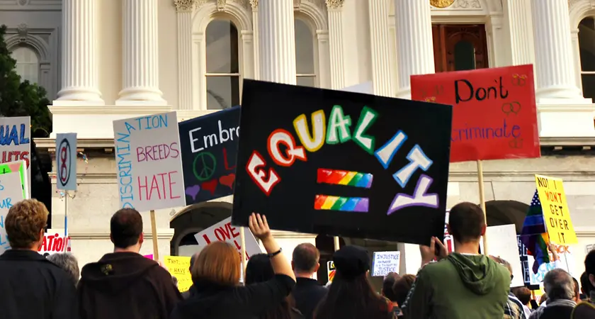 A sign being held at a protest which reads "EQUALITY"