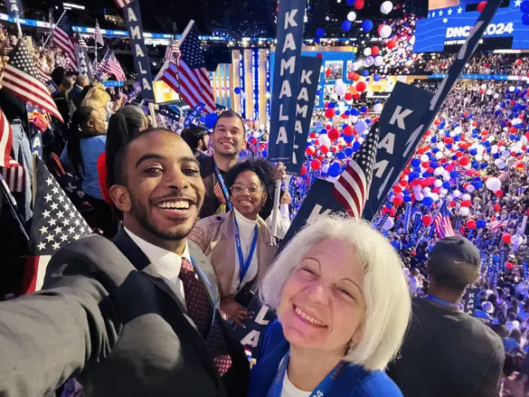 People For staff celebrate the nomination of Harris and Walz