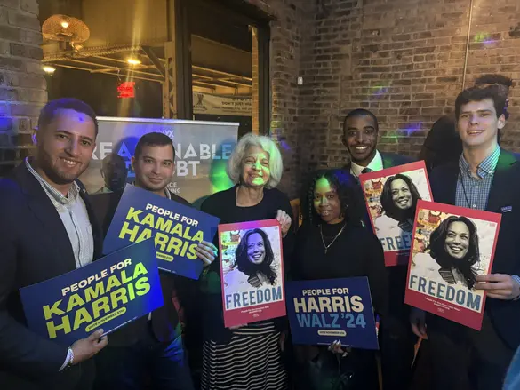 People For staff are live at the DNC with Harris Freedom signs