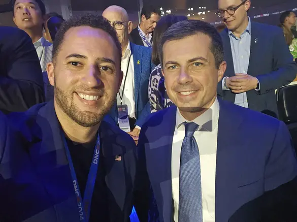 People For President Svante Myric with Transportation Secretary Pete Buttigieg