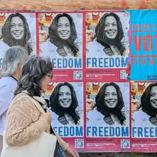 "Kamala Harris: Freedom" posted with people walking by