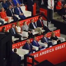 Several attendees, including Donald Trump, seated at the Republican National Convention