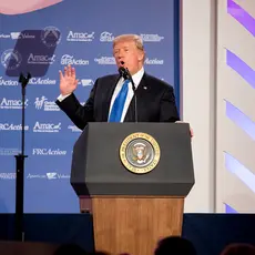 Donald Trump speaking in front of teleprompter