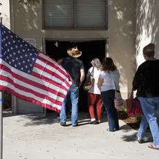 Voters waiting in line at polling place