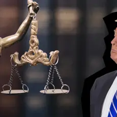 Lady Justice next to Donald Trump