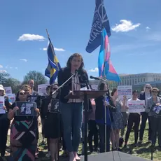 Charlotte Clymer speaking at rally