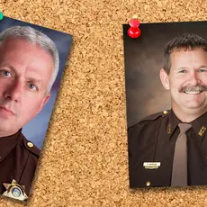 To images of male sheriffs pinned to a bulletin board.