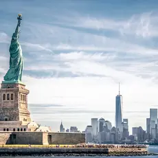 The Statue of Liberty with the New York City skyline in the background