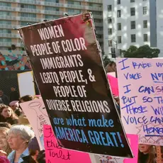 photo of people supporting immigration rights holding up signs