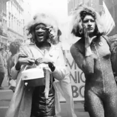 Marsha P. Johnson and Sylvia Rivera march in the street