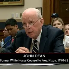 John Dean speaks during a committee meeting.