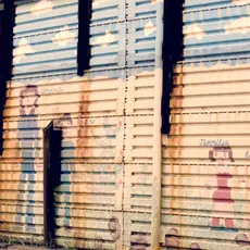 Paintings of children on the US -Mexico border wall in Arizona