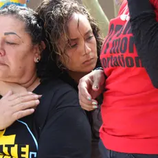 Supporters of Guadalupe García de Rayos and her family wait for updates during a rally attempting to prevent her deportation