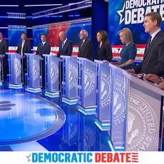 Candidates stand at their podiums during a Democratic presidential debate