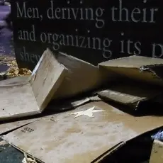 Cardboard boxes on the ground near the U.S. District Court in Seattle used by homeless individuals