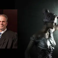 Michael Scudder superimposed on an image of Lady Justice.