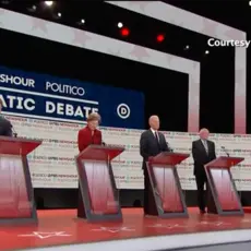 Democratic candidates on the stage during the December 2019 debate hosted by PBS Newshour and Politico