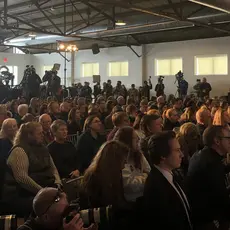 A crowd watches the stage at "We the People 2020" in Iowa on January 19, 2020.