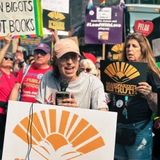 People For National Field Director Alana Byrd rallies a crowd in Philadelphia.