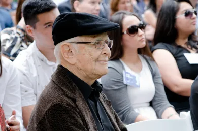 Norman Lear sitting with a group at a People For the American Way event
