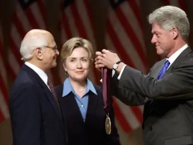 Norman Lear receiving an award from President Bill Clinton and Hillary Clinton